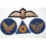 A Second World War Royal Canadian Air Force pilot's badge, together with US Army Air Force badges