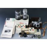 A Leica III G camera 1959, serial number 956211, in original carton with tag and instructions,
