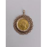 A George IV gold half Guinea coin pendant