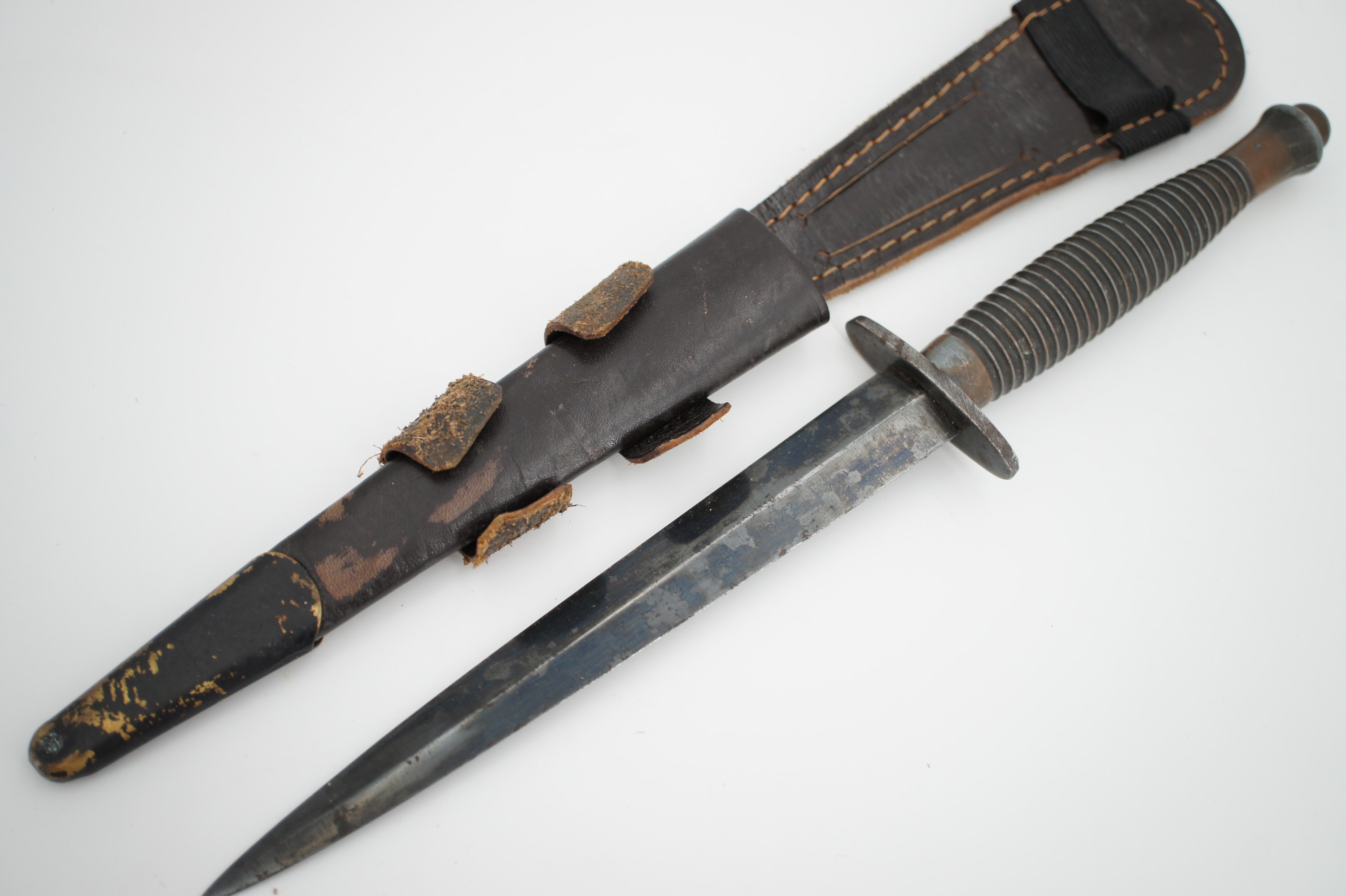 A Fairbairn Sykes / FS third pattern fighting knife, the grip bearing mould mark 3 - Image 4 of 6