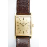 A lady's gold-plated Omega De Ville wrist watch, having a brushed gilt face and baton markers