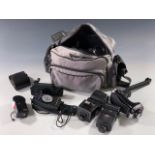 A camera bag containing a number of filters, Starblitz 300 DFC flash gun, Cobra MD210 flash gun