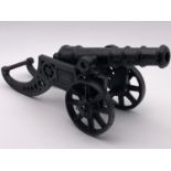 A cast iron model cannon, 44 cm