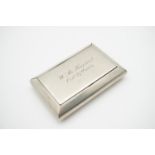 A Victorian gentleman's nickel snuff box with engraved presentation inscribed "W. M. Hunter [?]