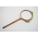 A late 19th / early 20th Century rolled gold lorgnette
