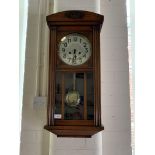 An oak wall clock, 73 cm
