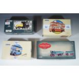 Four boxed Corgi buses and wagons