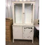 A pre-War heavy glazed-steel medical cabinet