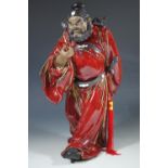 A large 20th Century Chinese Shiwan stoneware figure, 40 cm