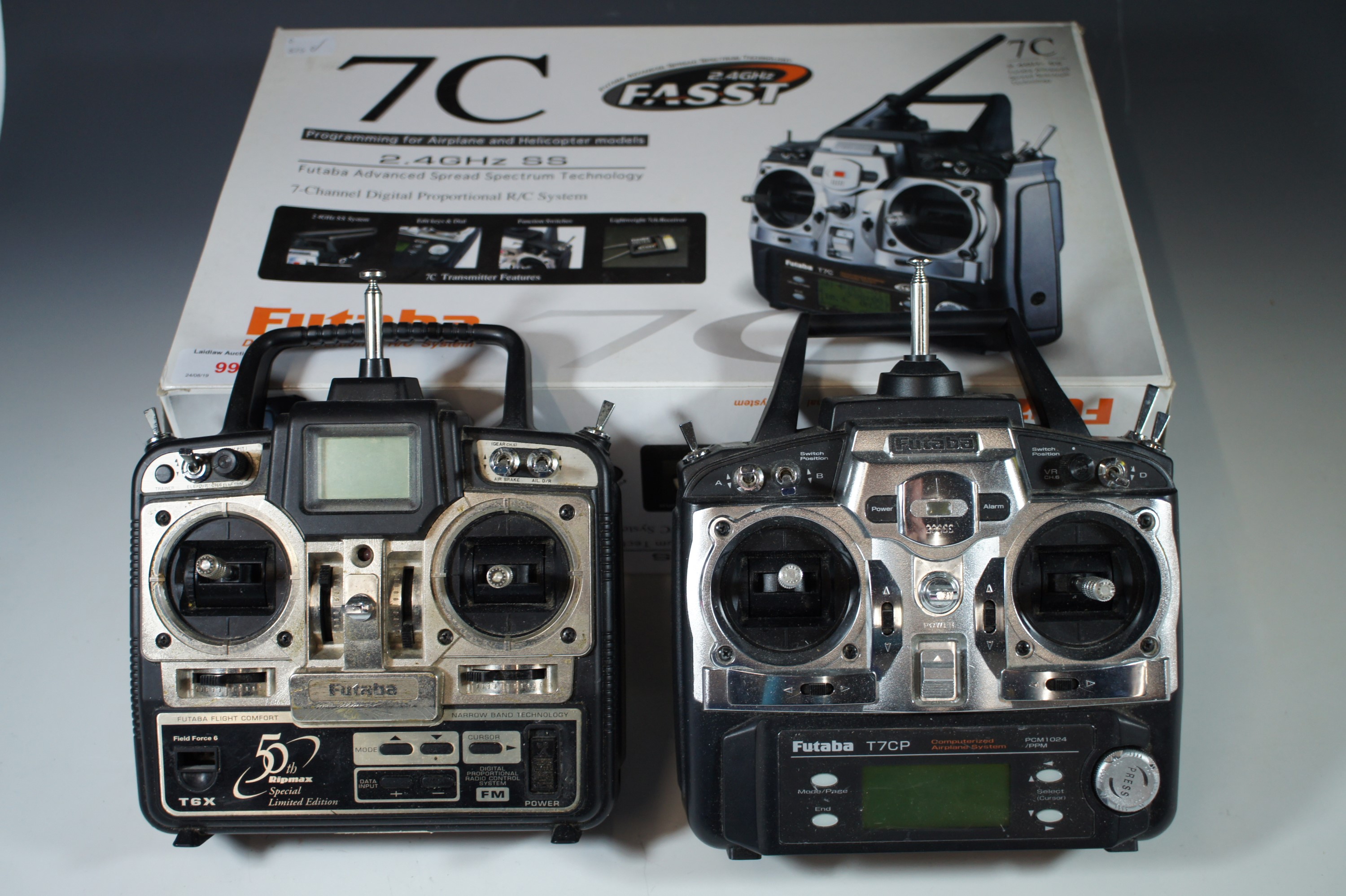 Three radio control handsets, Futaba T7C, Futaba T7CP and a T6X
