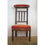 A Victorian turned and upholstered prie-dieu chair