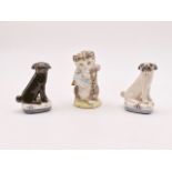 A Beswick Beatrix Potter Miss Moppet figurine and two pugs by Miranda Smith