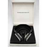 A set of Bang and Olufsen U70 stereo headphones in original packaging