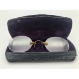 A cased pair of Victorian pince-nez