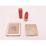 A 1950s Stratton "No2" lipstick holder, a Coty powder compact, and one other with a needlework