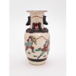 A small Chinese Shiwan crackle ware vase, 14 cm