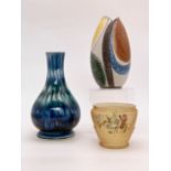 A Royal Worcester vase, a Porthmadog vase and one other