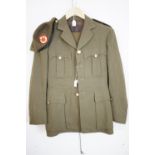 An army tunic and beret