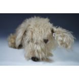 A vintage plush soft toy dog