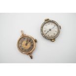 A 1920s lady's 9ct gold cased wrist watch, having a diaper engraved face and silvered chapter (a/