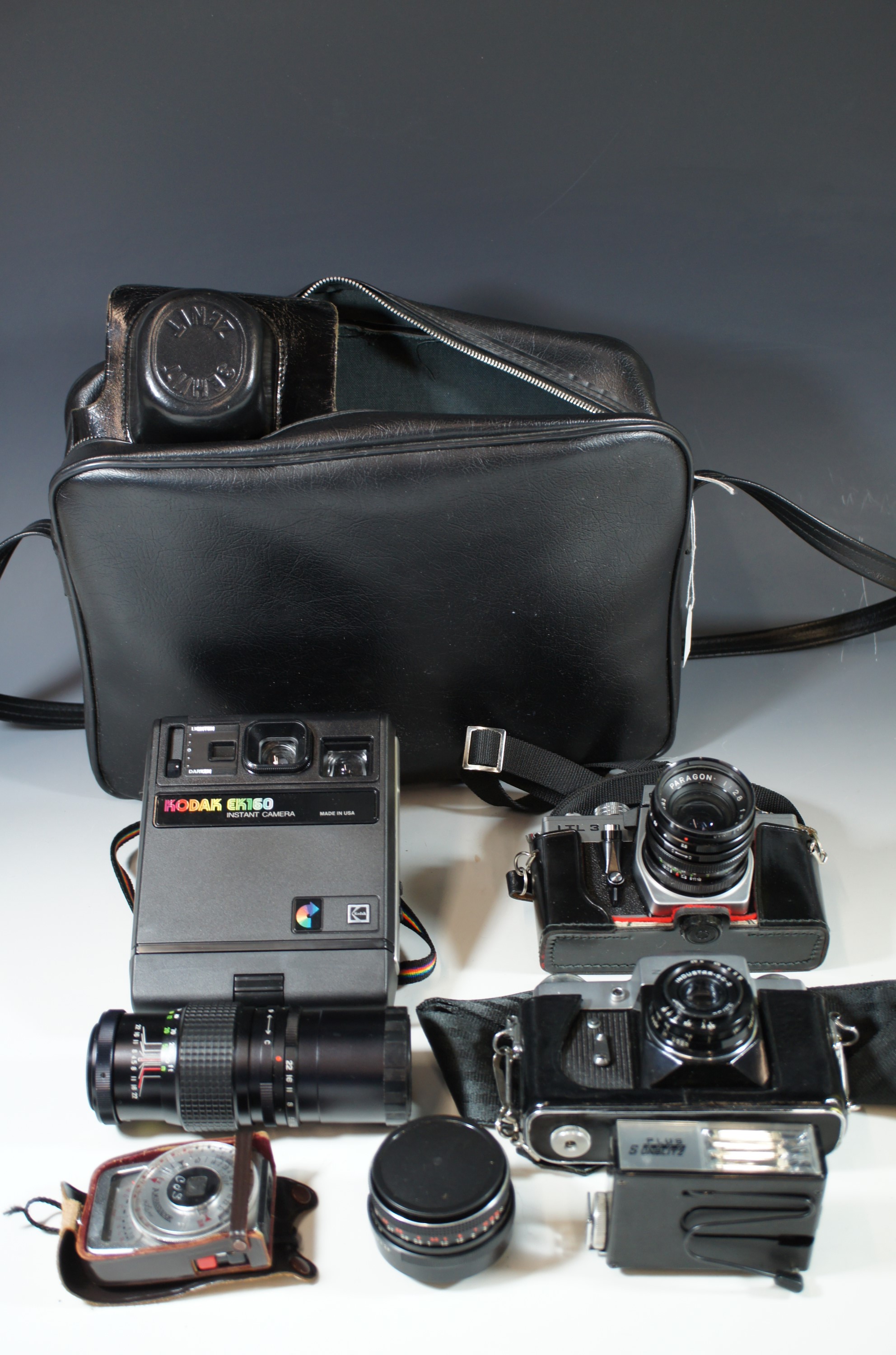 Praktika LTL 3 camera with Paragon 1:2.8 35 mm lens, Zenit B with Industar-50-2 lens, a Kodak