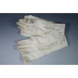 A pair of vintage ladies gloves.