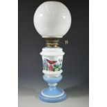 A Victorian hand-enamelled glass oil lamp