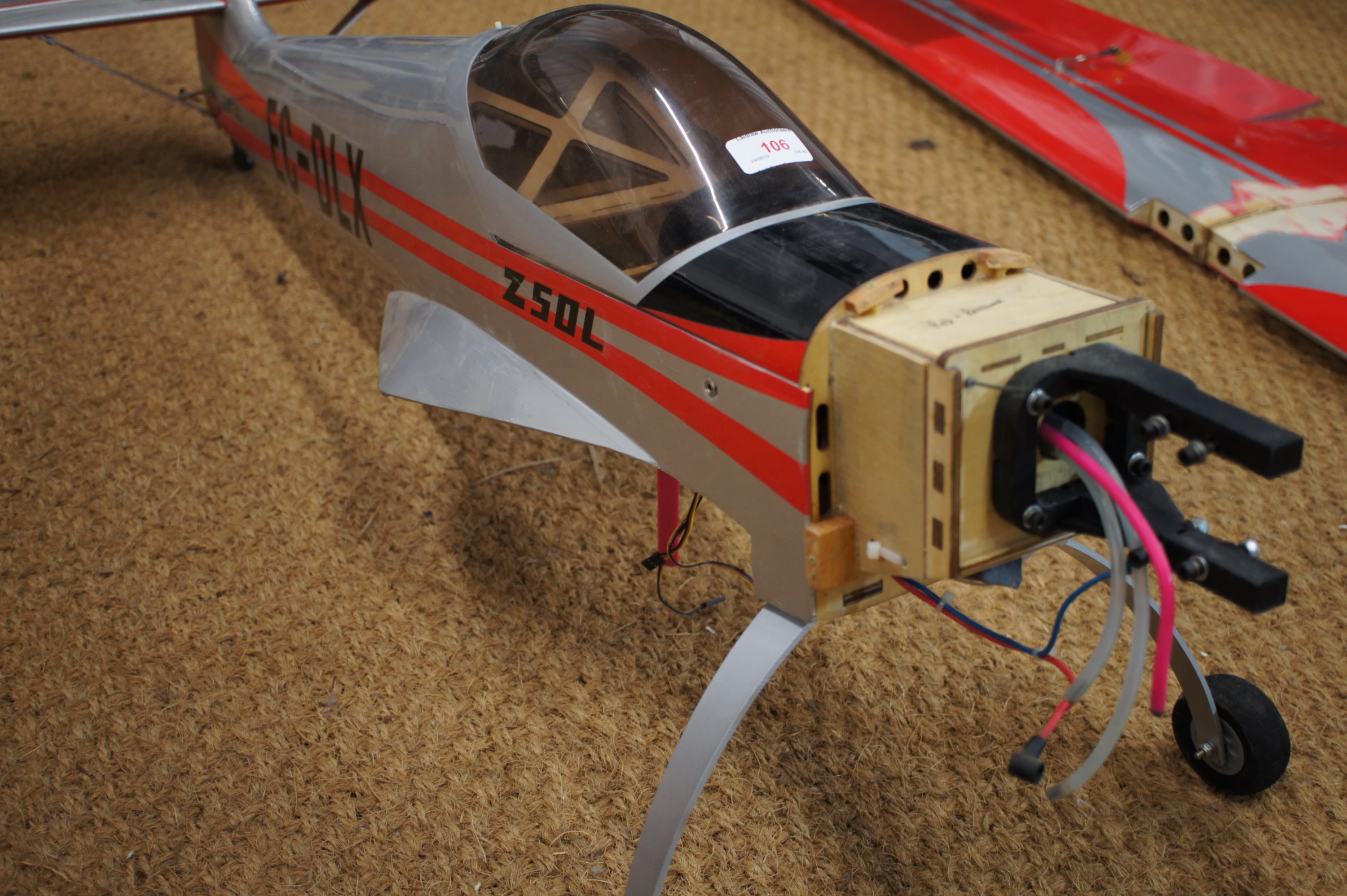 A large remote control model aircraft silver and red EC-DLX wingspan 63" (160 cm) Length 4' (122 - Image 3 of 3