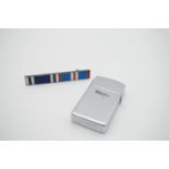 A Pratt and Whitney engines zippo lighter and medal ribbon bar