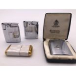 A vintage cased Ronson Varaflame cigarette lighter and others