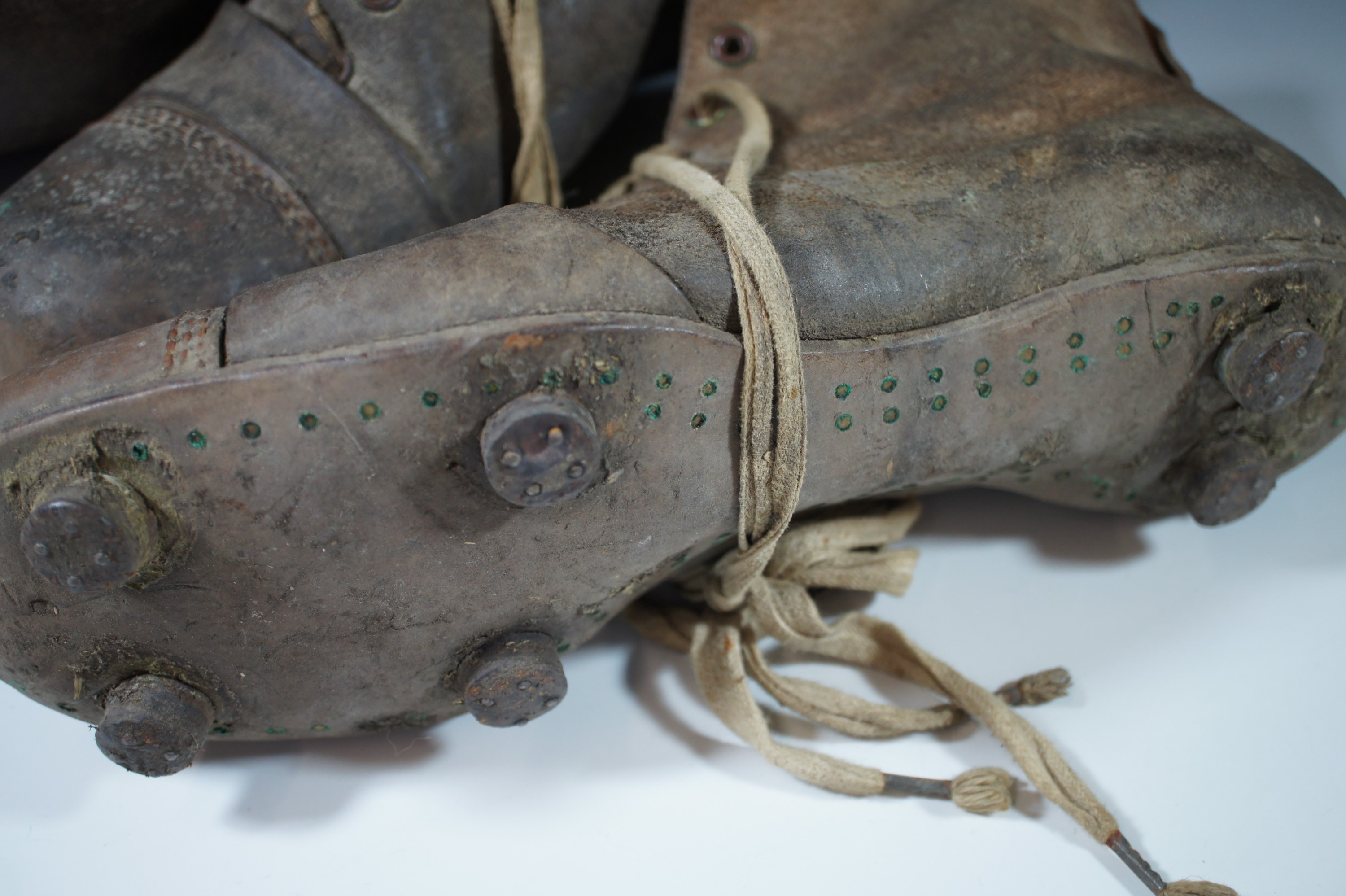 A vintage leather rugby ball and boots - Image 2 of 2