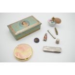 Collectors' items including a Queen Elizabeth II coronation souvenir tin and folding knife, a silver