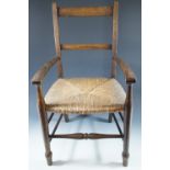 A late 19th Century child's rush seated chair