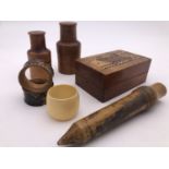 [Treen] A 19th Century turned wooden glass syringe case, two pharmacist's jars in turned cases, a