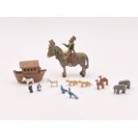 A Hantel enamelled die-cast miniature Noah's ark and animals, together with a donkey and articulated