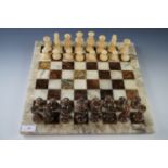 A modern resin chess set and board