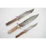 Three English Bowie knives, the largest by the firm of George Wostenholm, the blade marked "original