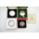 Miscellaneous cased commemorative silver medallions / coins, including an Elizabeth and Philip