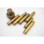 Sundry brass shell / cartridge cases and an inert 1950s artillery fuse body