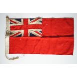 A small Royal Navy red ensign cotton flag, of multi-piece construction, 38 cm x 70 cm, early to