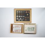 Three framed displays of British coins and banknotes, KGV - QEII