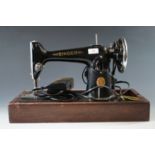 A vintage Singer electric sewing machine