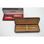A Parker 51 fountain pen and pencil set, and one other cased Parker pen