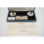 A Windsor Mint cased limited edition sterling silver ingot and medallion commemorating the Diamond