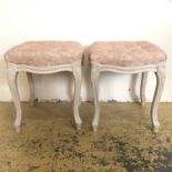 A pair of French style stools with pink brocade upholstery