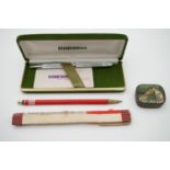 A cased 1970s Waterman ball-point pen, together with a Cumberland Pencil Co "King's Own" clutch