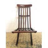 A vintage oak folding chair