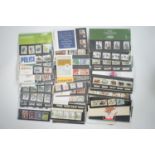 A large number of GB QEII mint stamp presentation packs