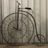 An old reproduction penny farthing bicycle