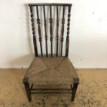 A mahogany rush seated chair